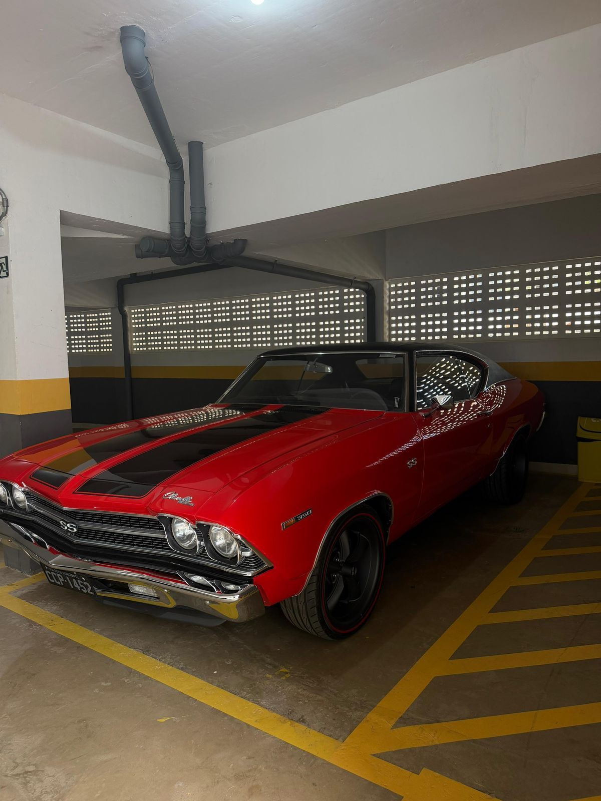 Chevelle SS 1969 — lateral, rodas escuras e perfil muscle car